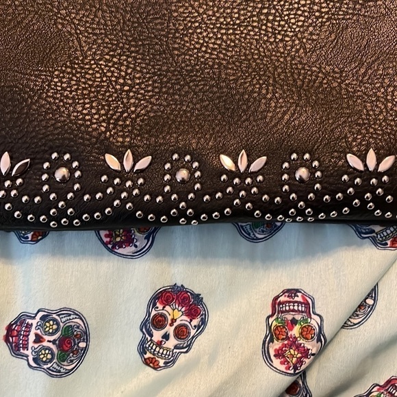 Unknown brand silver studded clutch in black with and attached strap. - Picture 2 of 4